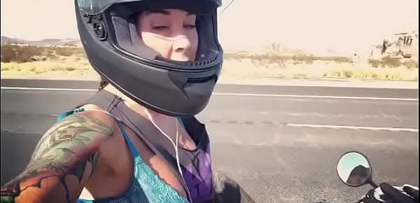  felicity feline motorcycle babe riding aprilia in bra